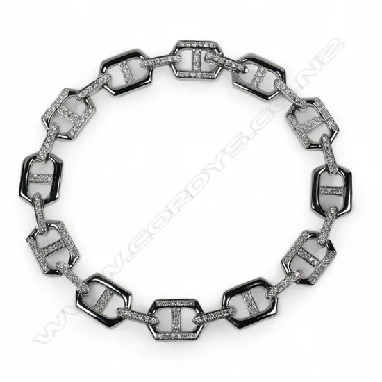 A 9ct white gold and diamond bracelet,