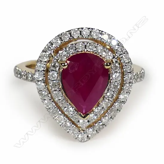 A 14ct gold ruby and diamond double halo ring,