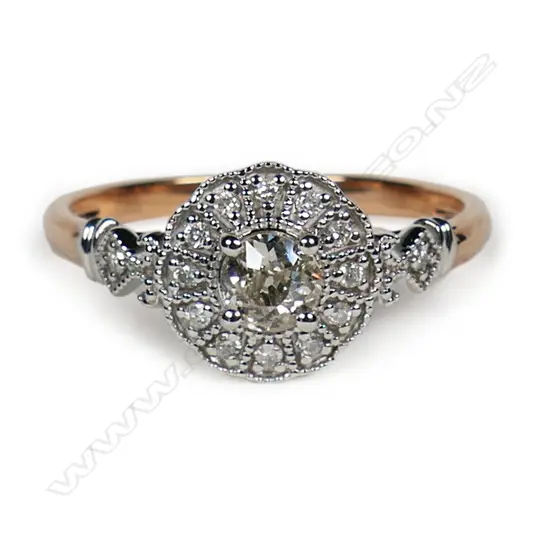 A 14ct rose and white gold antique style diamond ring,