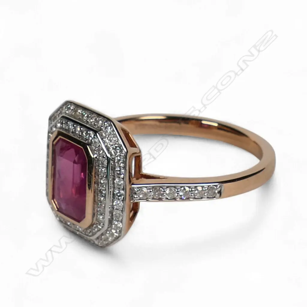 A 14ct rose gold ruby and diamond double halo ring, Image 1++