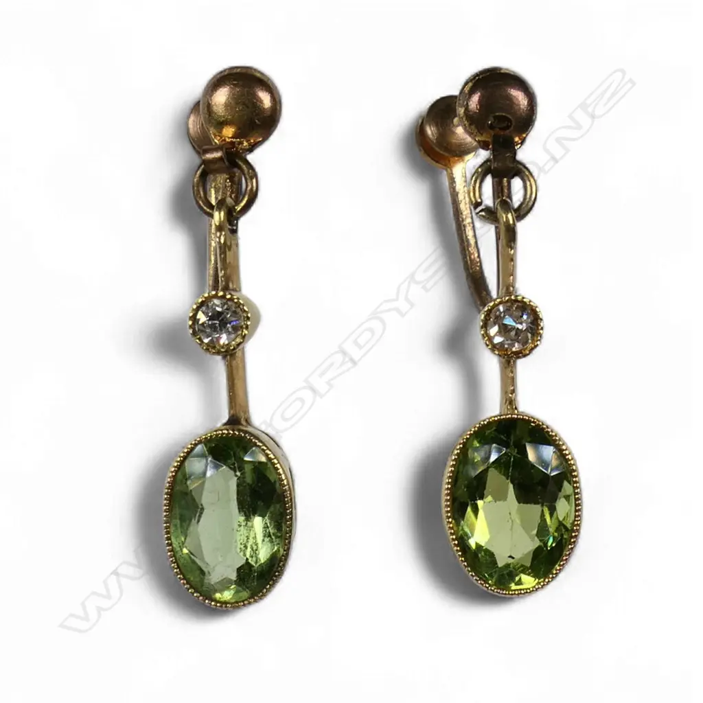 A pair of Edwardian 15ct gold peridot and diamond drop earrings, Image 1++