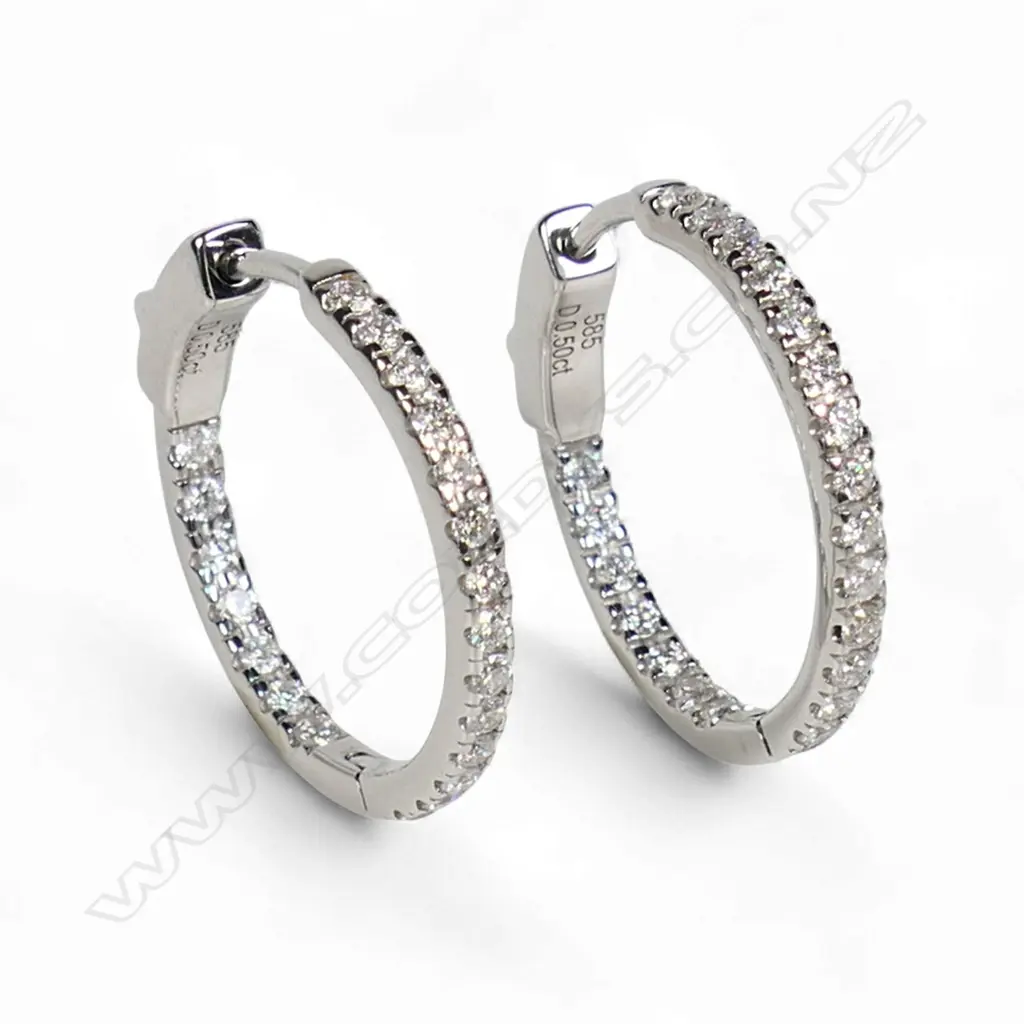 A pair of 14ct white gold and diamond hoop earrings, Image 1++