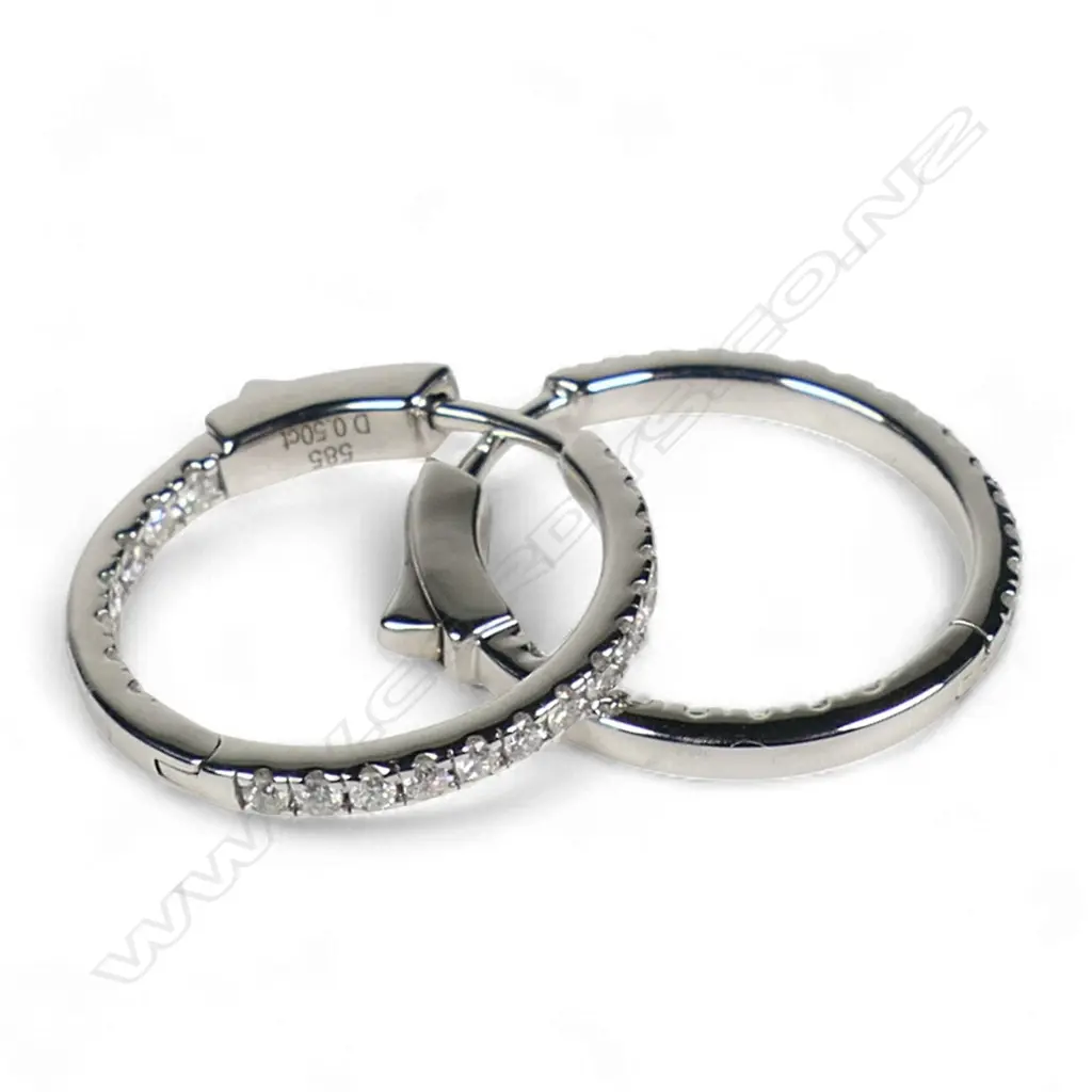 A pair of 14ct white gold and diamond hoop earrings, Image 1++