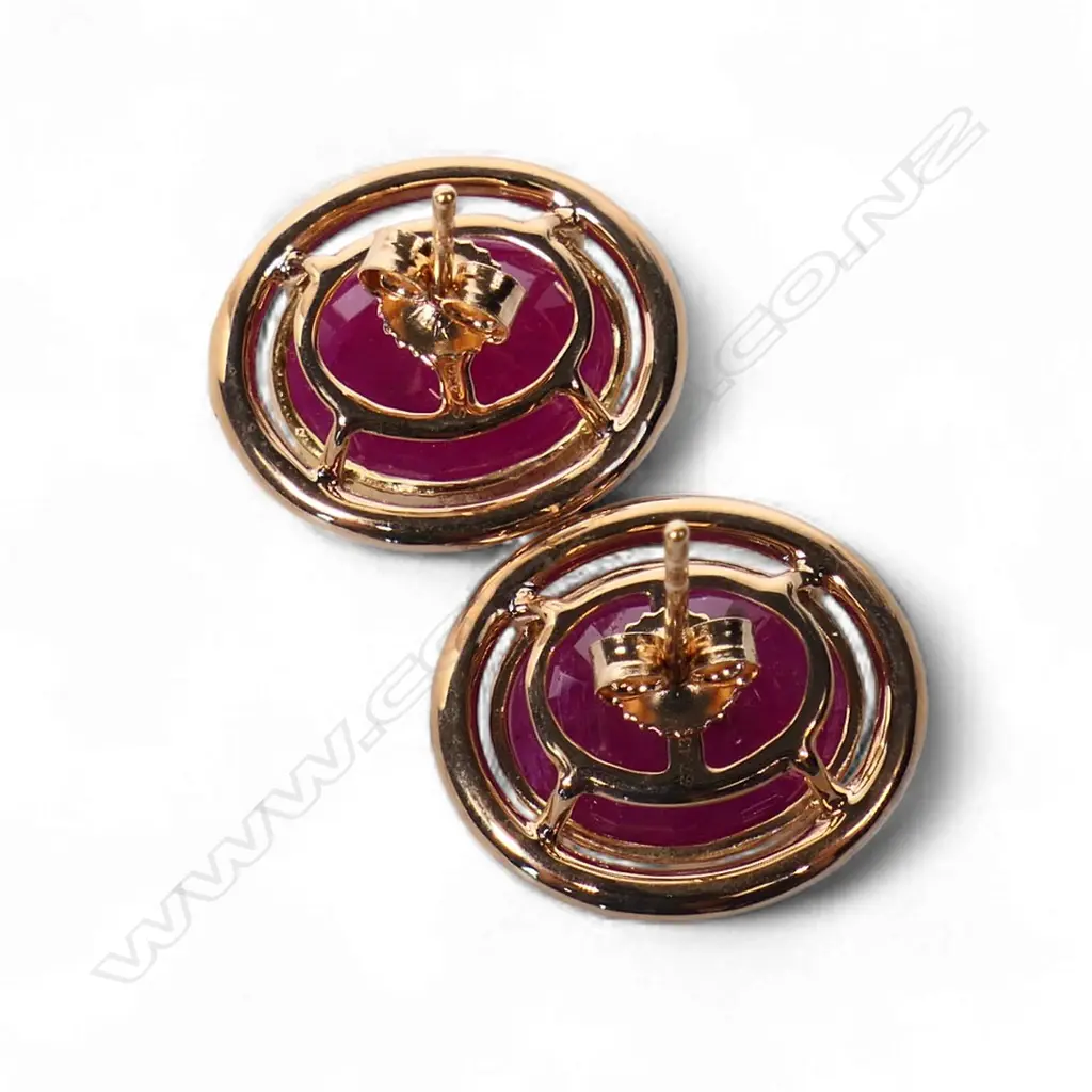 A pair of 14ct rose gold ruby and diamond halo stud earrings, Image 1++