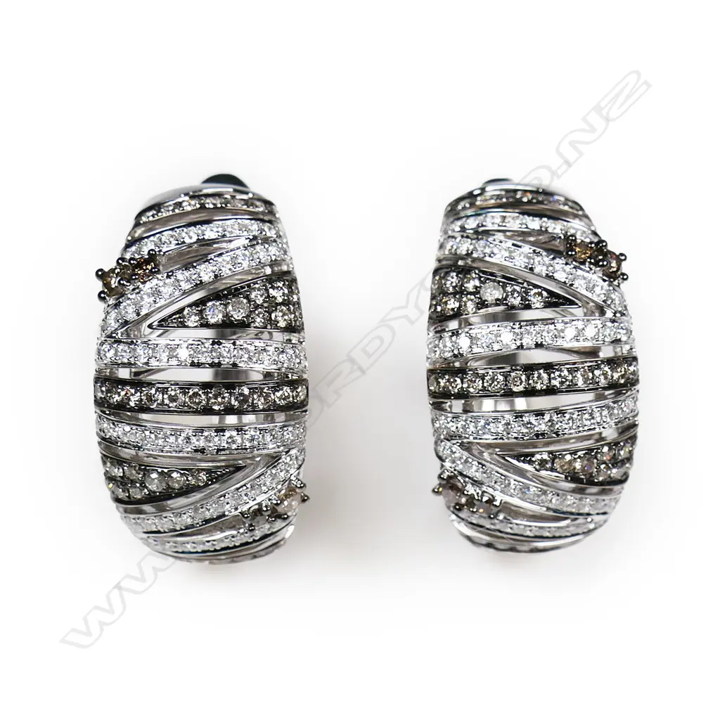 A pair of 18ct white and black gold diamond earrings, Image 1++