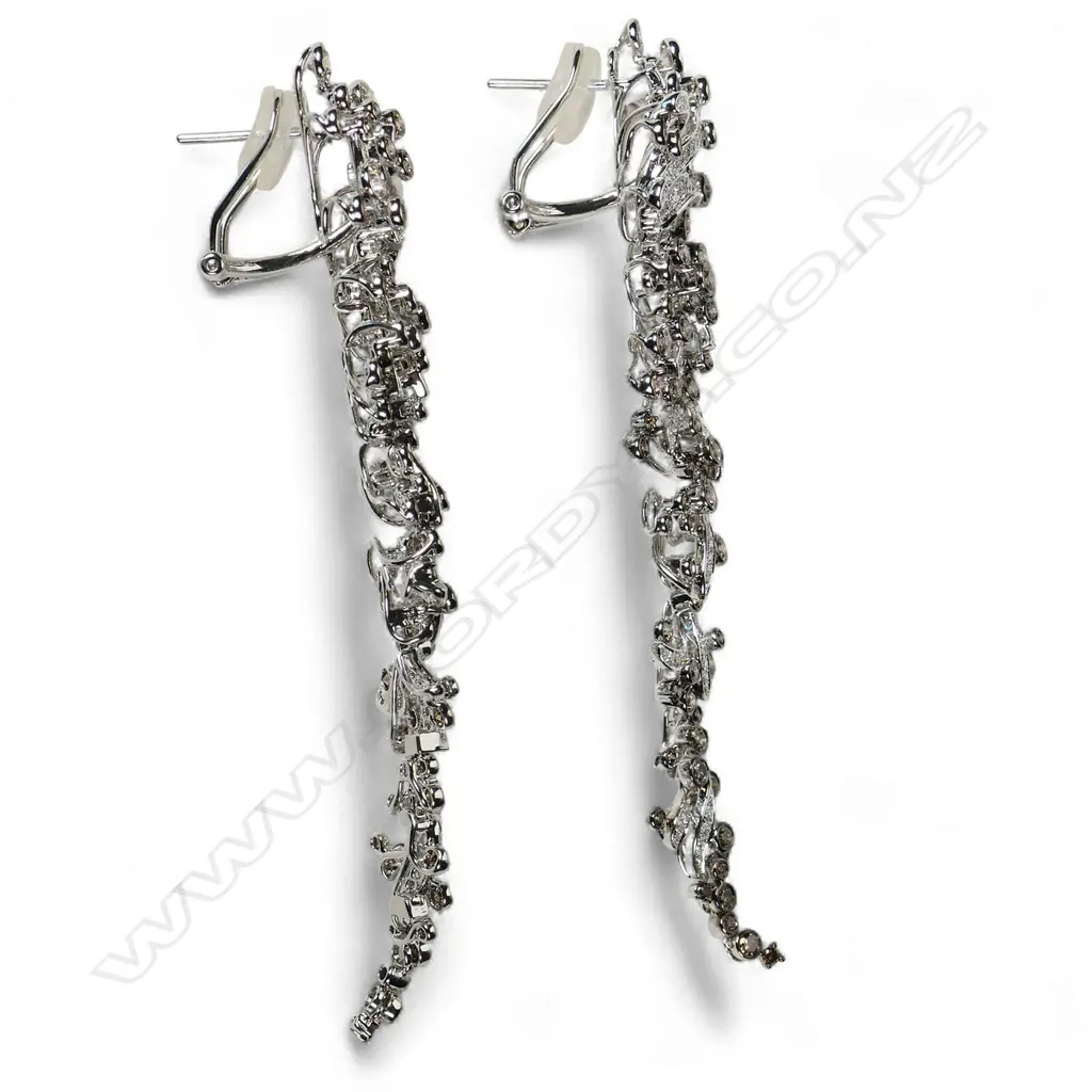 A pair of 18ct white and black gold diamond earrings, Image 1++