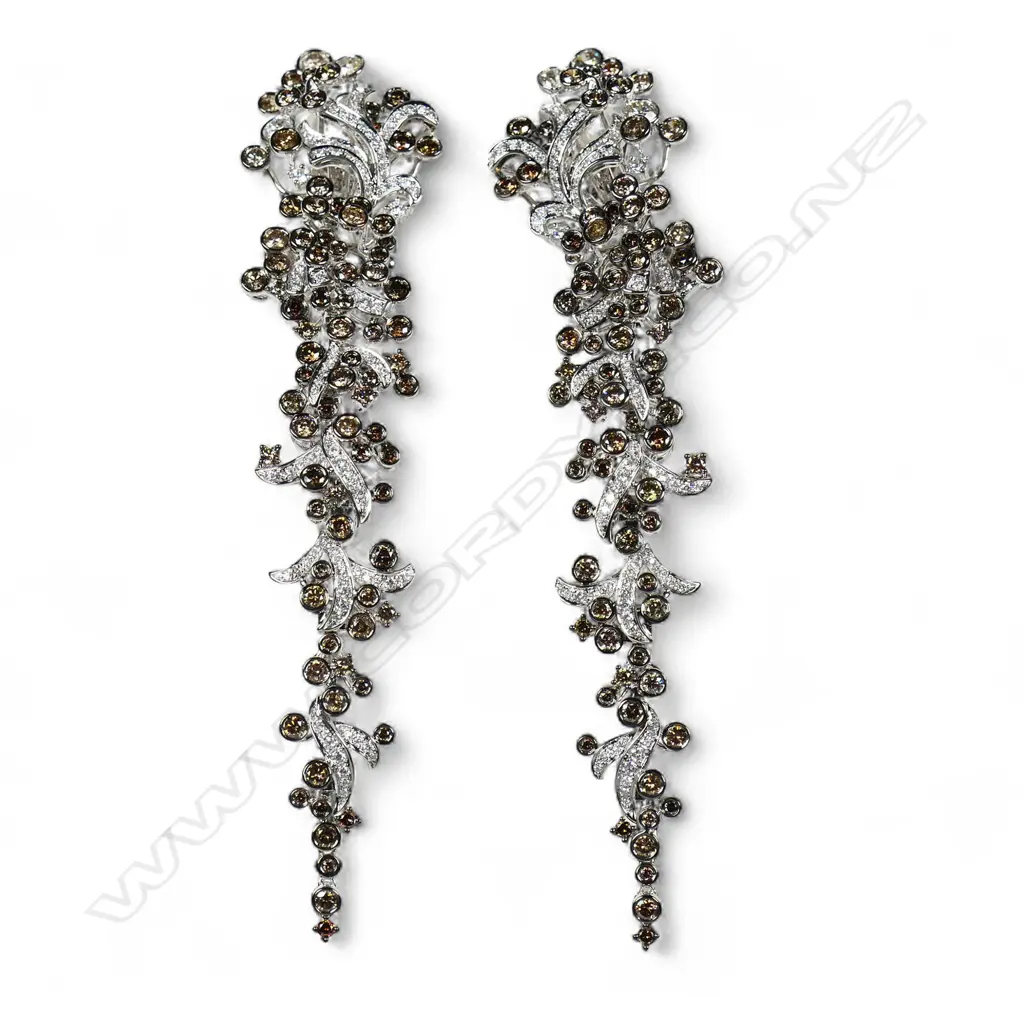A pair of 18ct white and black gold diamond earrings, Image 1++