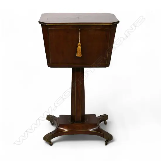 A Regency flame mahogany brass inlaid teapoy,