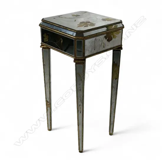 A mirrored side table,
