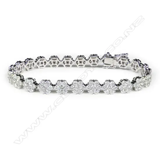 An 18ct white gold and multi diamond bracelet,