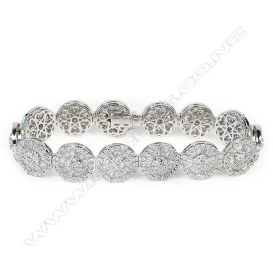 An 18ct white gold and multi diamond bracelet,