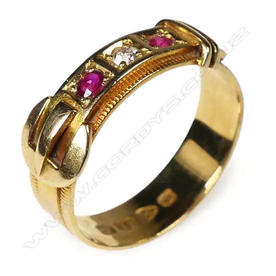 An Edwardian 18ct yellow gold ruby and diamond buckle ring,