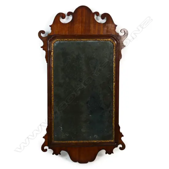 An 18thC George lll parcel-gilt mahogany wall mirror,