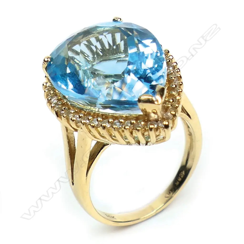 A 14ct gold London Blue topaz and diamond dress ring, Image 1++