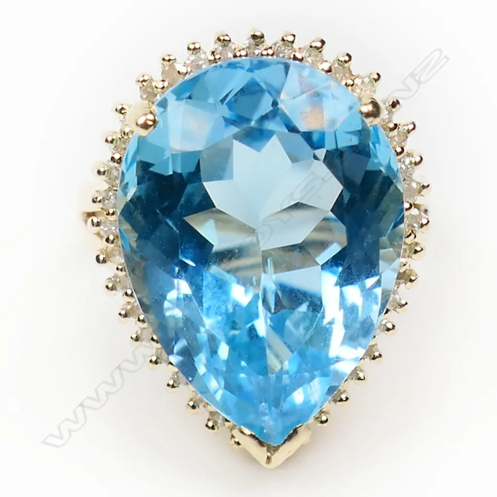 A 14ct gold London Blue topaz and diamond dress ring, Image 1++