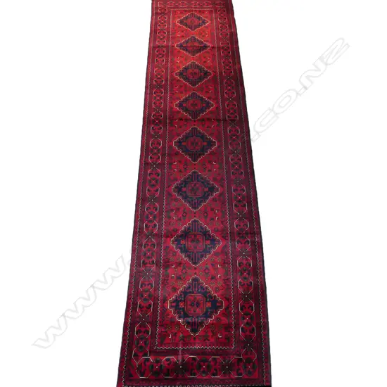 A hand-knotted Khamyab runner,