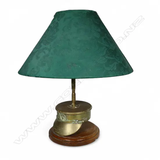 A WWII brass trench art presentation military cap lamp,