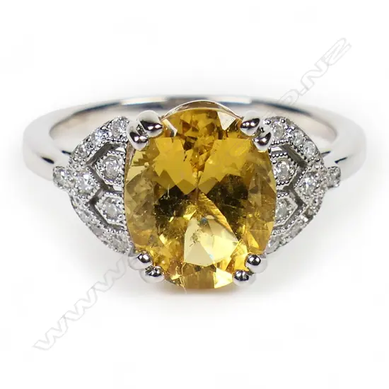 A 14ct white gold heliodor and diamond vintage style ring,