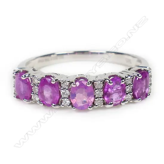 A 14ct gold pink sapphire and diamond band,