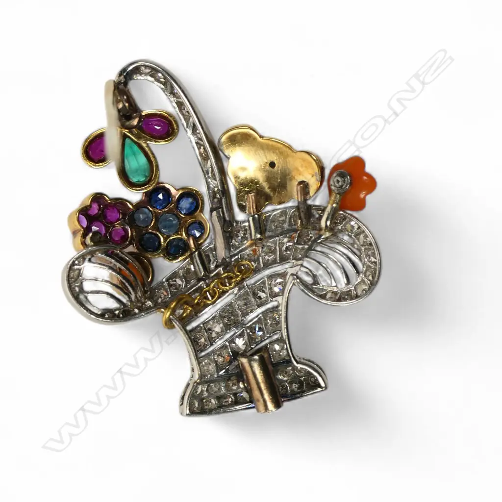 An early 20thC belle époque platinum and yellow 18ct gold coloured stones and diamonds basket brooch, Image 1++