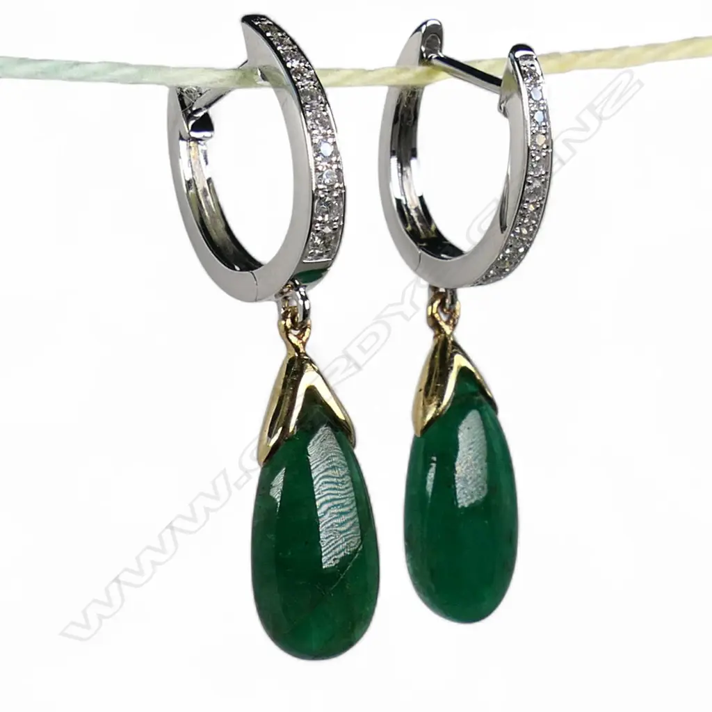 A pair of 18ct white gold emerald and diamond earrings, Image 1++
