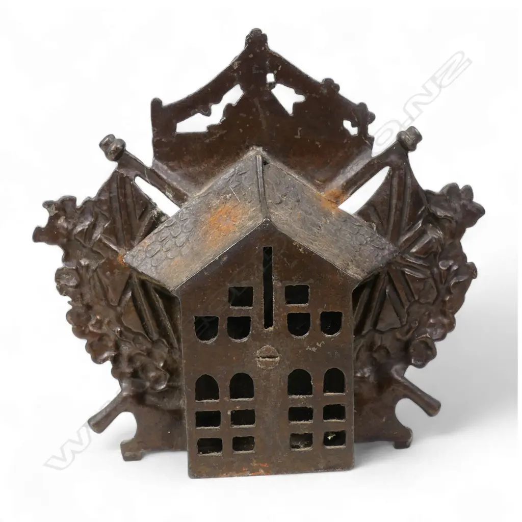 An early 20thC cast iron 'Dreadnought' still money bank, Image 1++