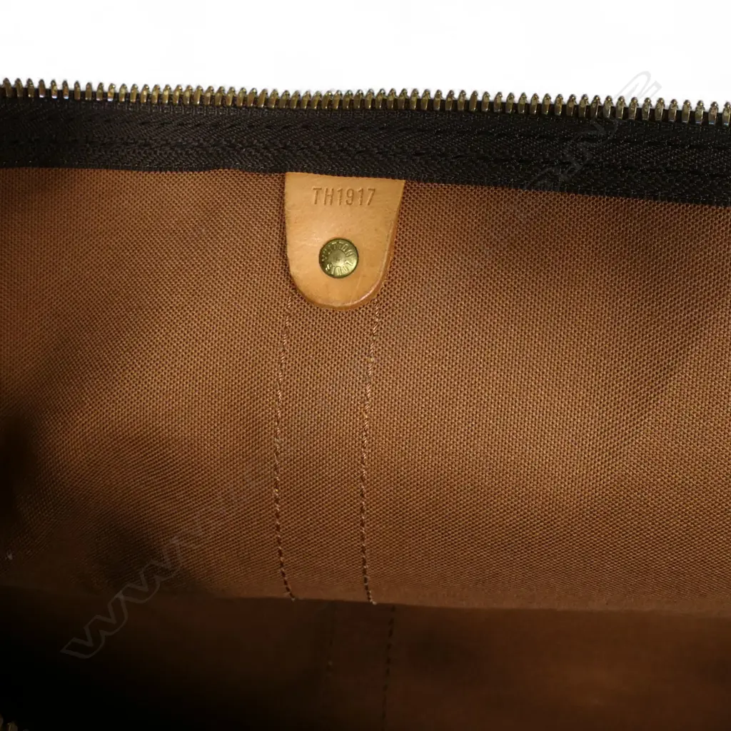 A Louis Vuitton 'Keepall Bandoulière 55' travelling bag, Image 1++