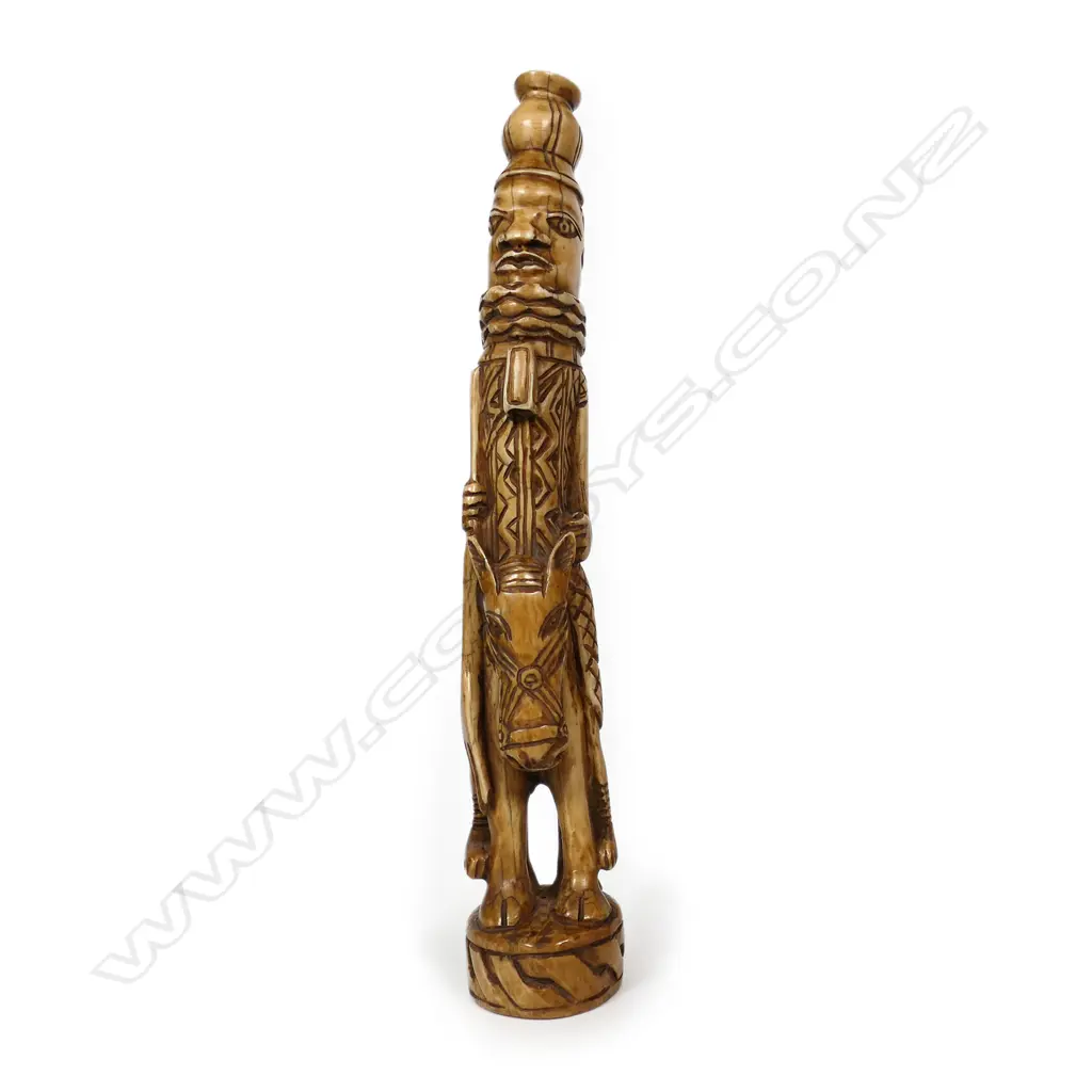 An early 20thC Nigerian carved ivory tusk section, Image 1++