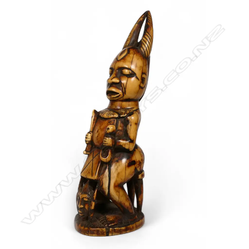 An early 20thC large, heavy and solid Nigerian carved ivory demonic Ibeji, Image 1++
