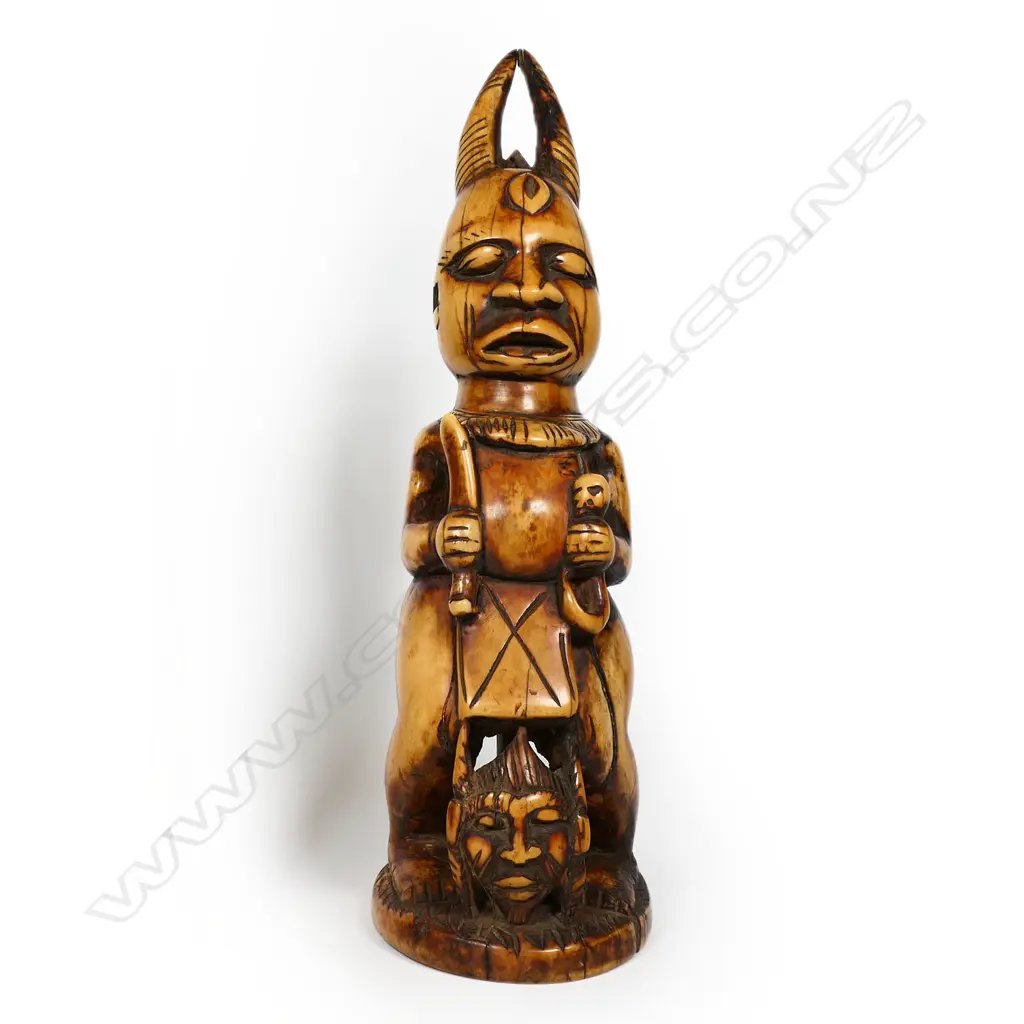 An early 20thC large, heavy and solid Nigerian carved ivory demonic Ibeji, Image 1++