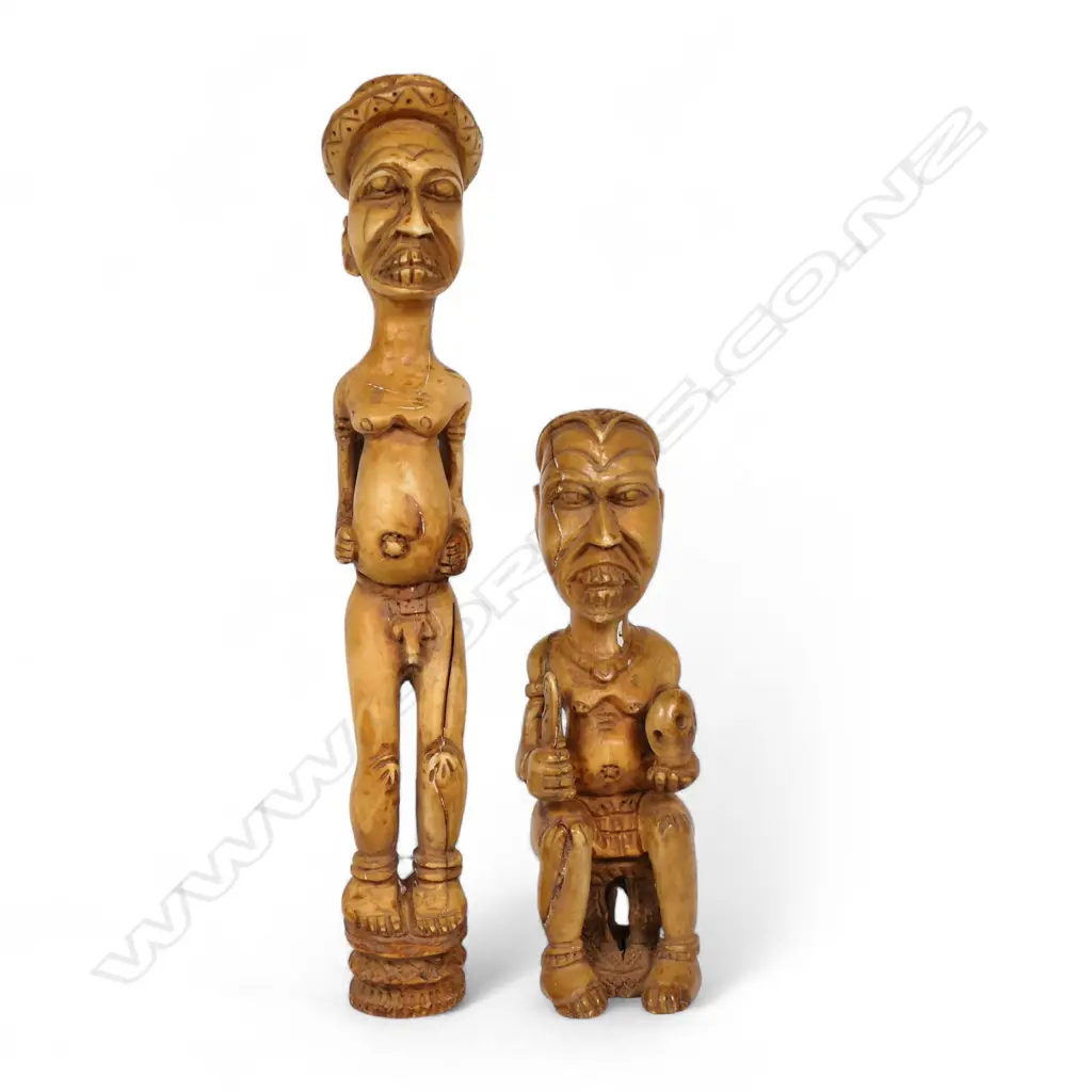 A pair of early 20thC Nigerian carved ivory figures, Image 1++