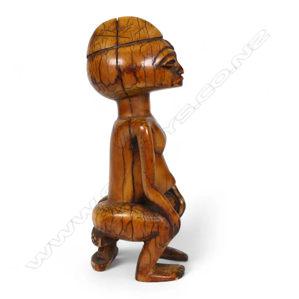 An early 20thC African ivory tribal fertility figure, Image 1++
