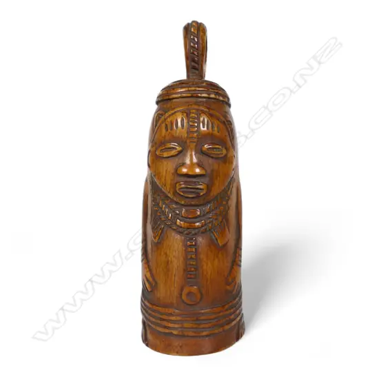 An early 20thC Nigerian carved ivory bell,