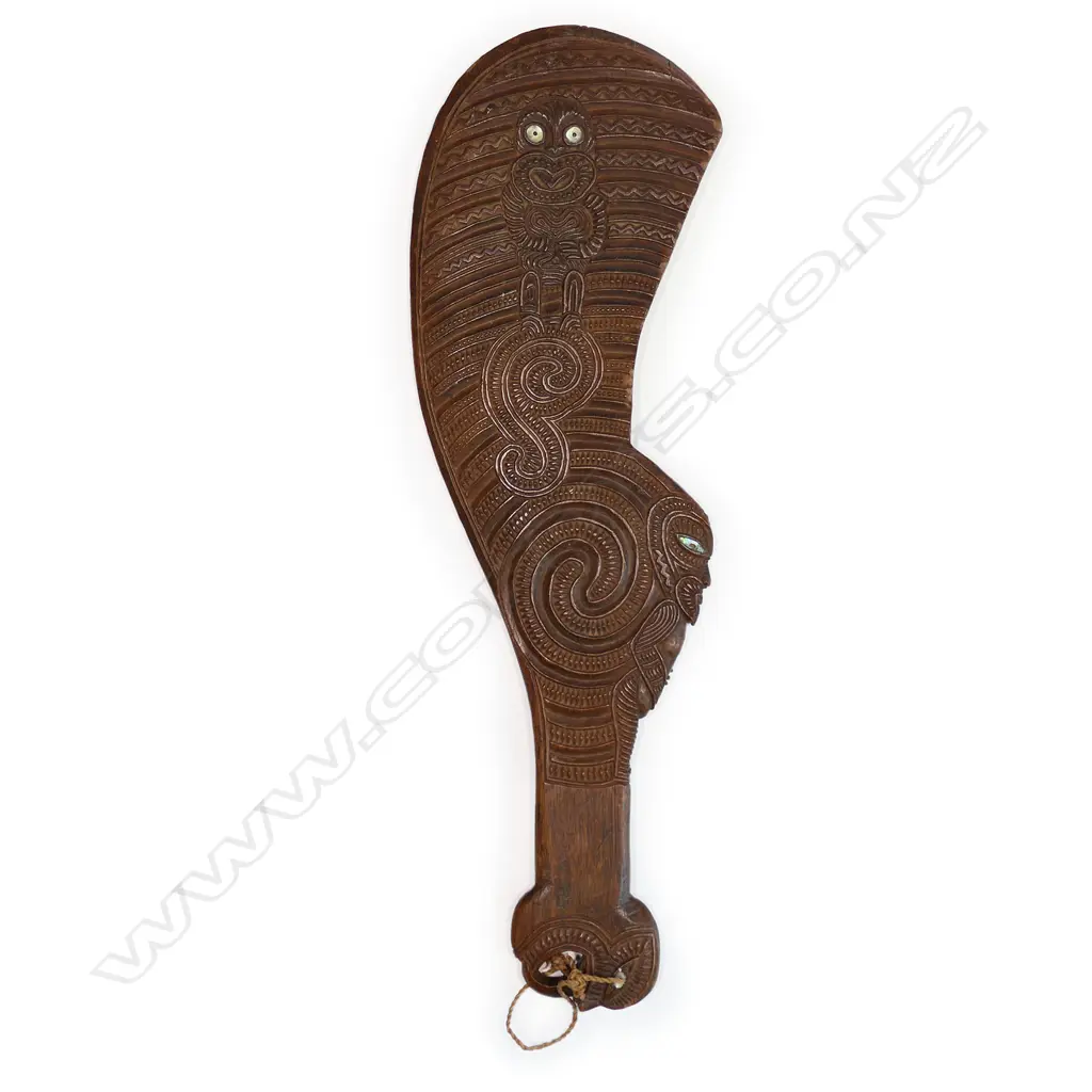 An old finely carved Māori wahaika hand club, Image 1++