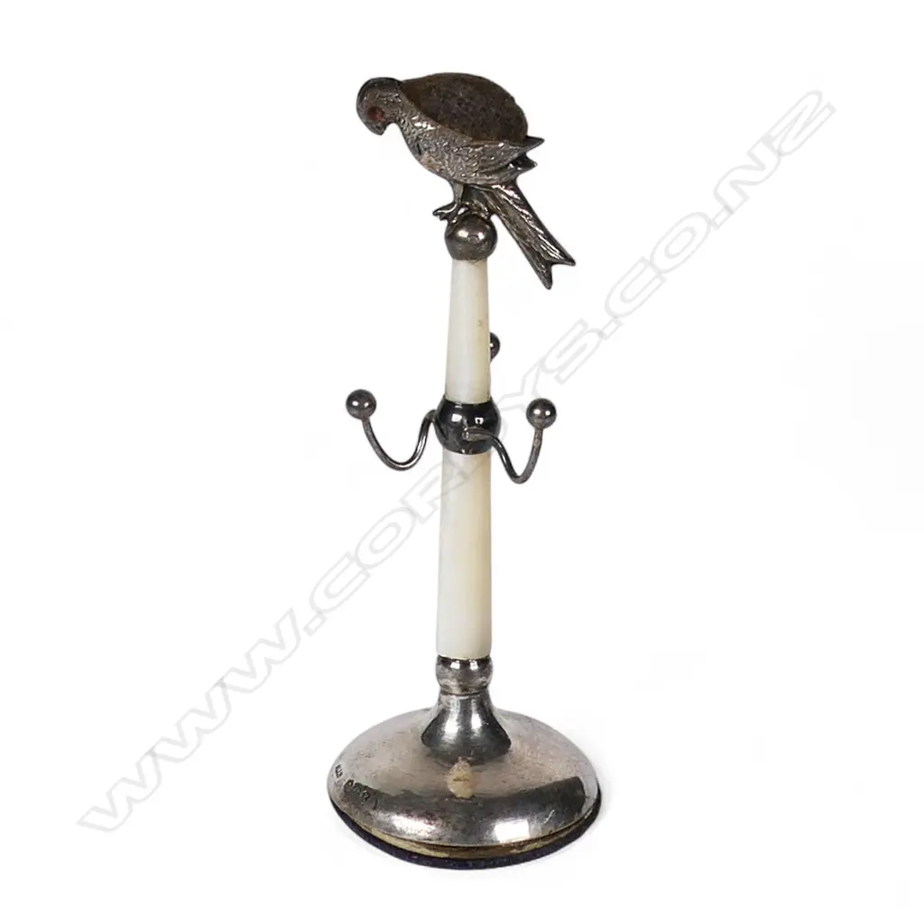 A 1920's silver and mother of pearl bird pin cushion, Image 1++