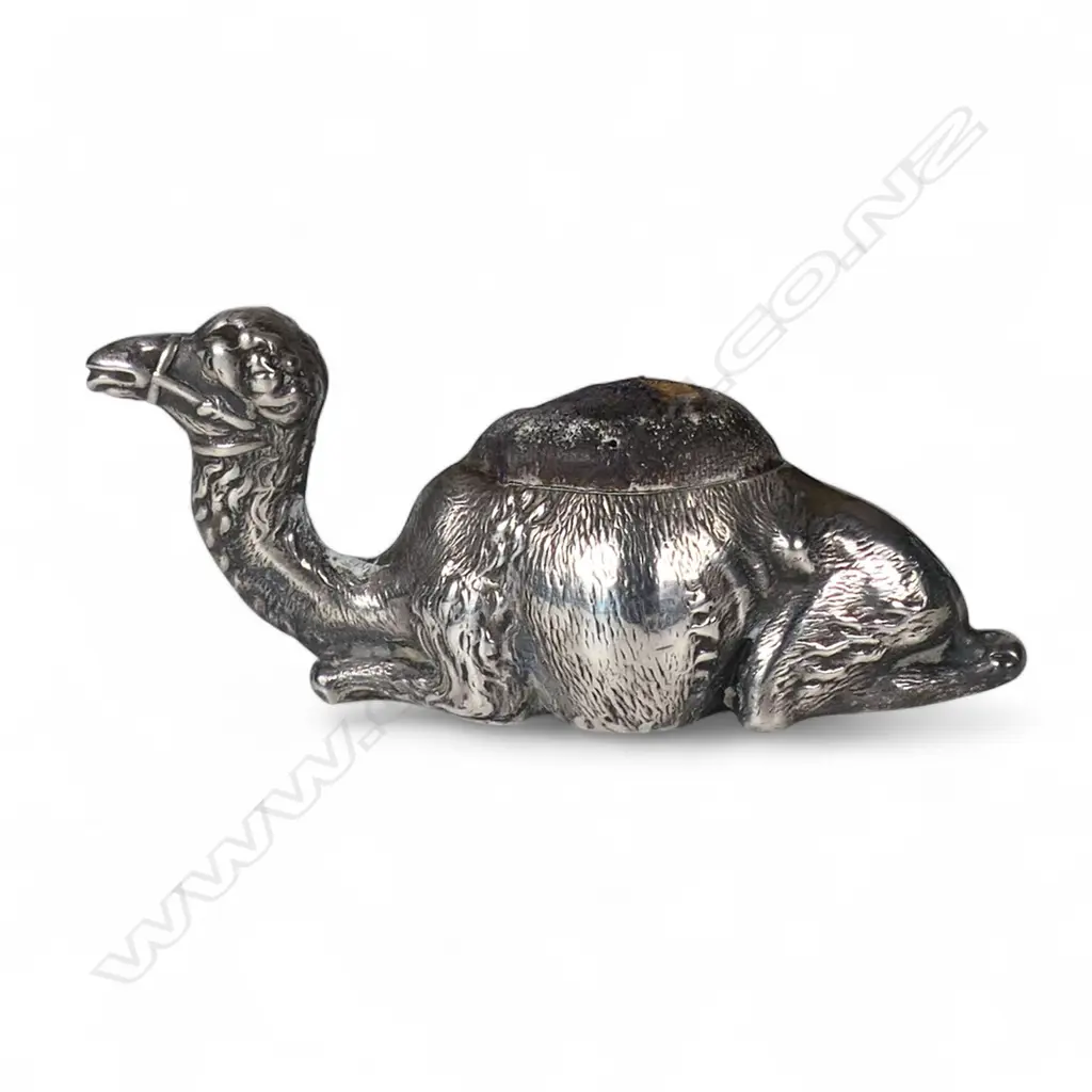 An Edwardian silver recumbent camel pin cushion, Image 1++