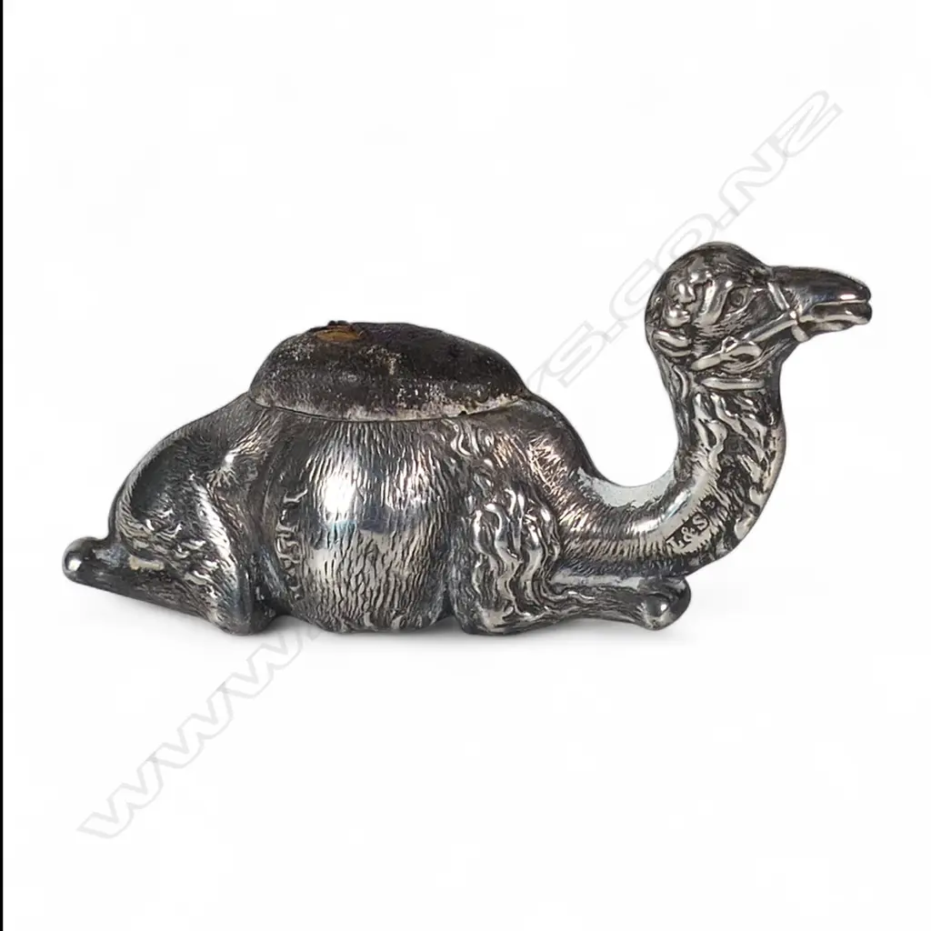 An Edwardian silver recumbent camel pin cushion, Image 1++