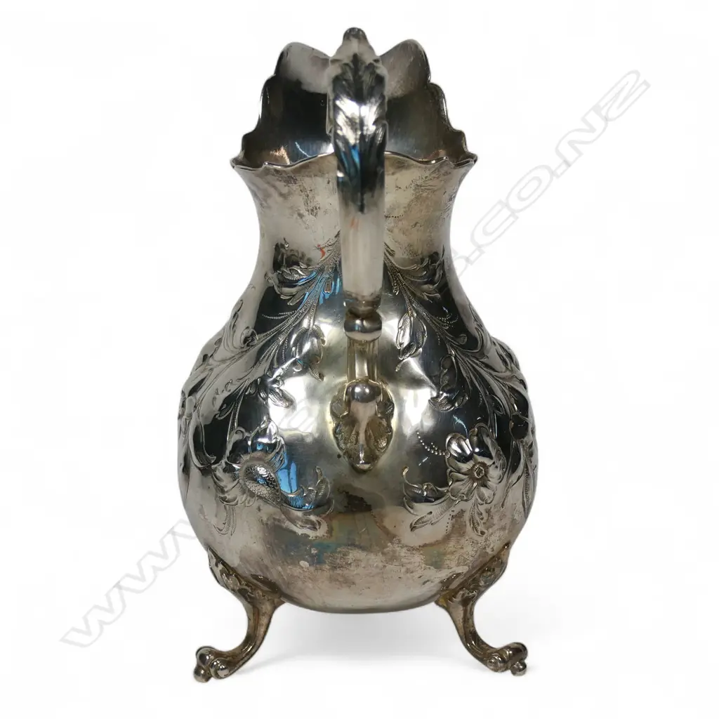 Early Victorian repousse silver cream jug, Image 1++