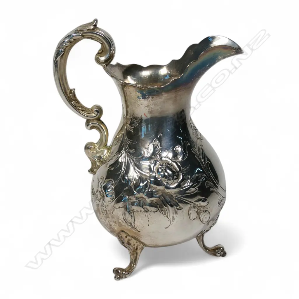 Early Victorian repousse silver cream jug, Image 1++