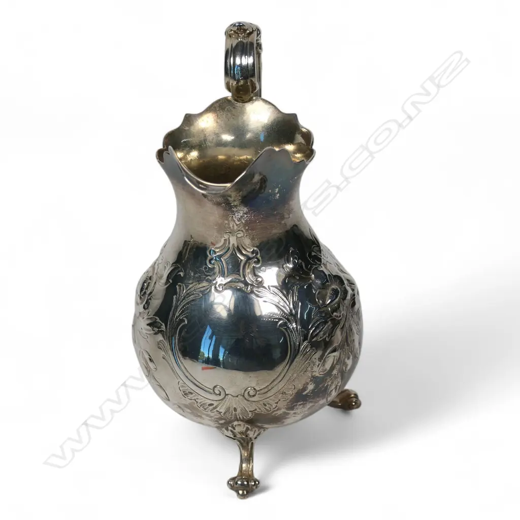 Early Victorian repousse silver cream jug, Image 1++