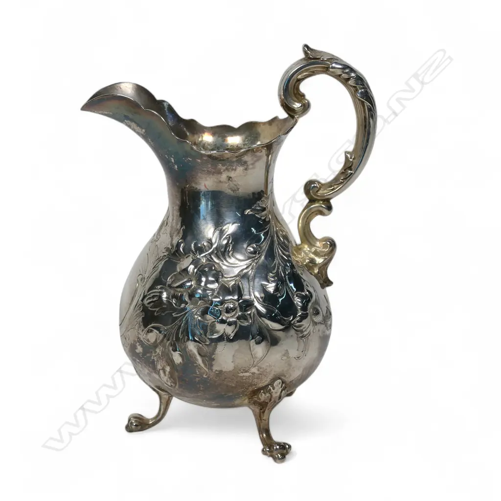 Early Victorian repousse silver cream jug, Image 1++
