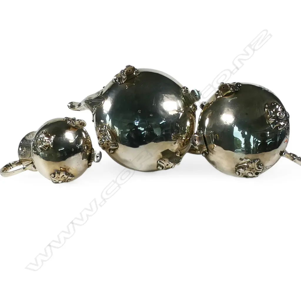 A fancy Victorian silver three-piece tea service, Image 1++