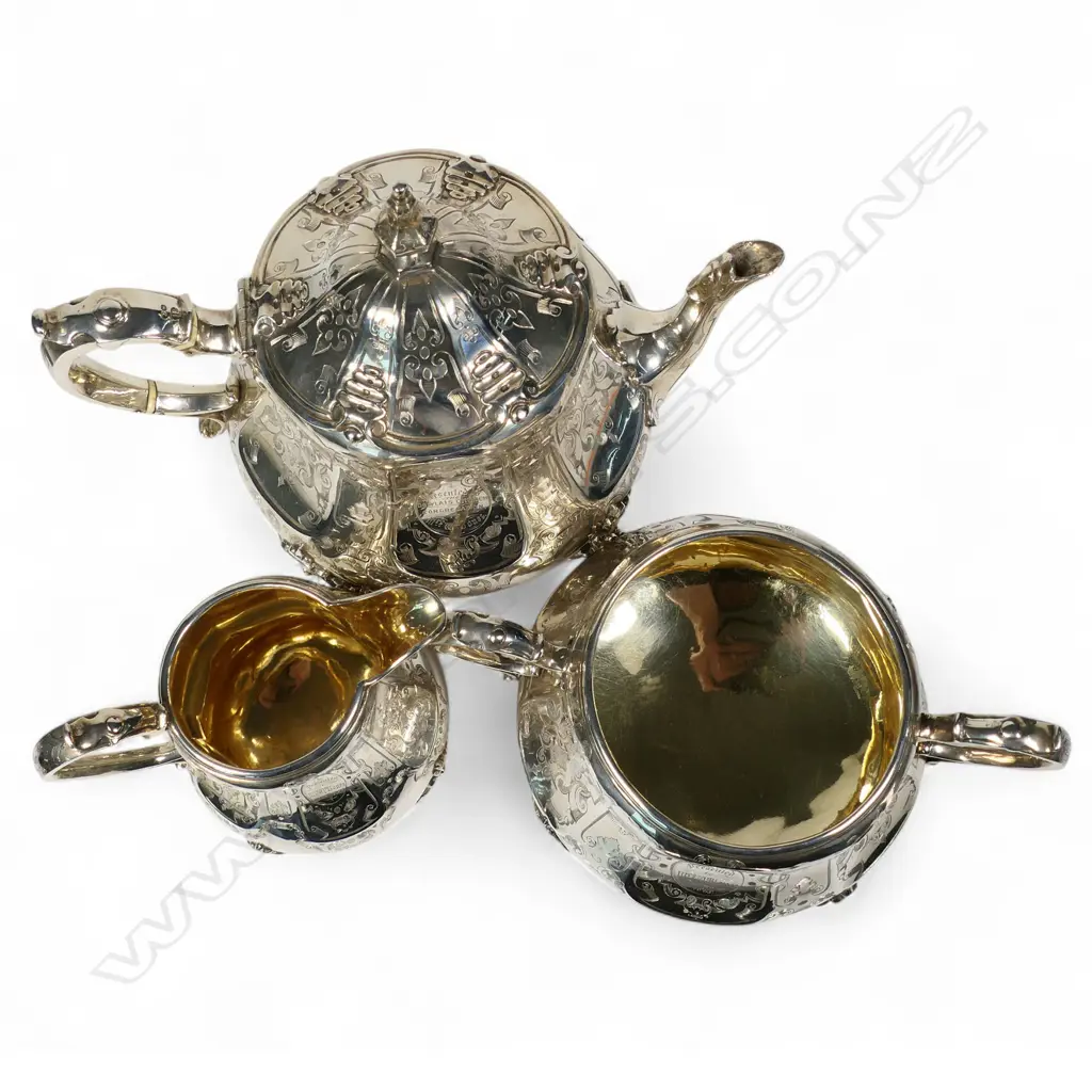 A fancy Victorian silver three-piece tea service, Image 1++
