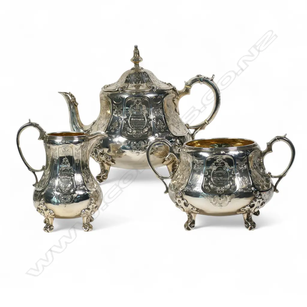 A fancy Victorian silver three-piece tea service, Image 1++