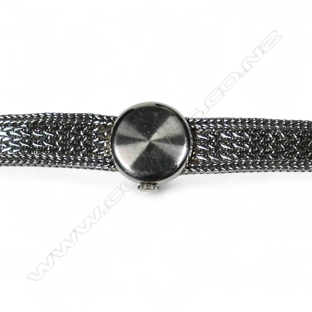 An ladies 18ct white gold and gem set Movado wristwatch, Image 1++