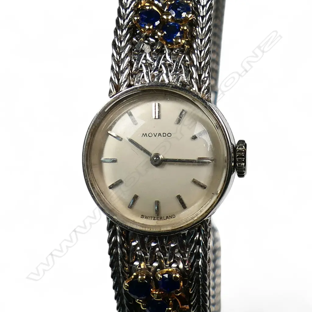 An ladies 18ct white gold and gem set Movado wristwatch, Image 1++