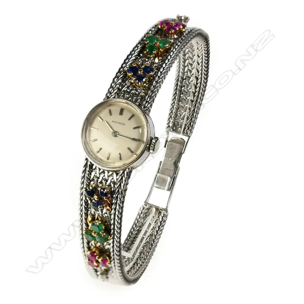 An ladies 18ct white gold and gem set Movado wristwatch, Image 1++