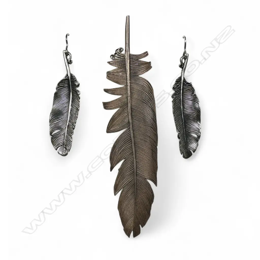 A contemporary artist made silver large feather brooch and similar earrings, Image 1++