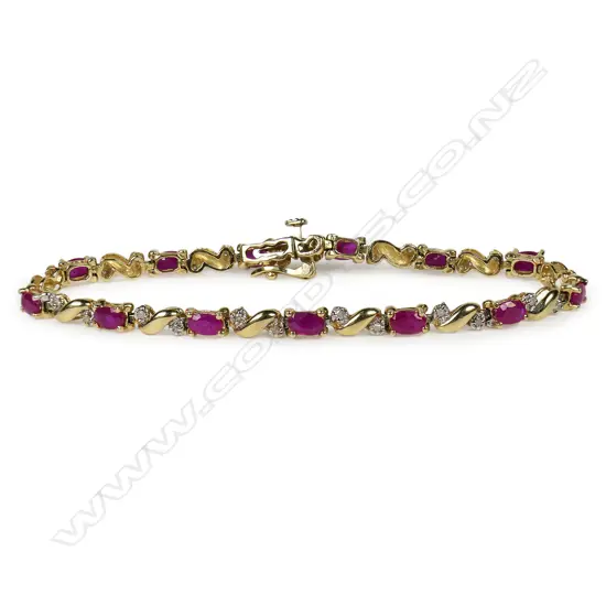 A 14ct gold diamond and ruby bracelet,