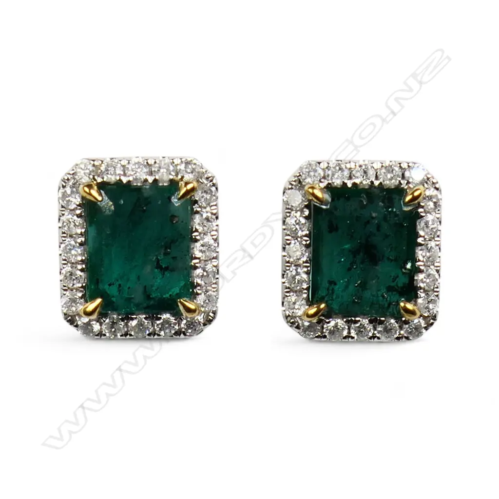 A pair of 14ct white gold emerald and diamond earrings, Image 1++